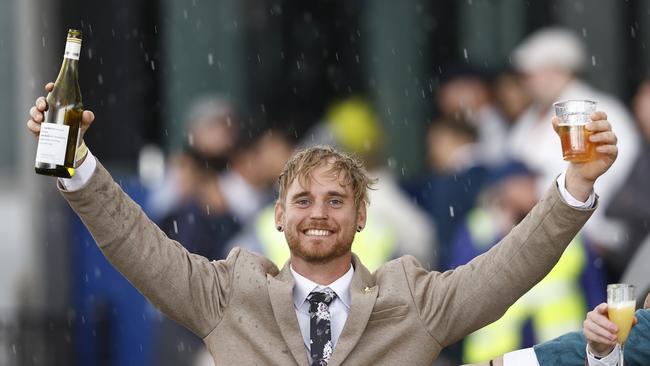 Winners are grinners. Photo by Darrian Traynor/Getty Images