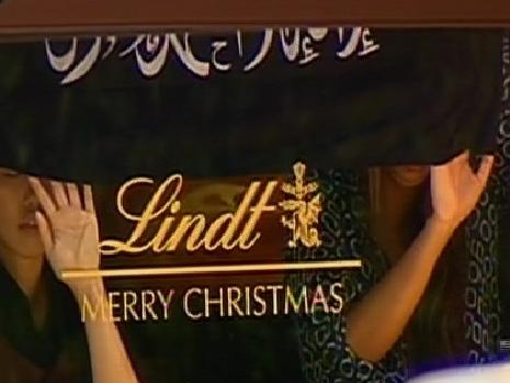 Channel 7 screen grab of a siege at the Lindt Cafe in Sydney's Martin Place. Picture: Cahnnel 7