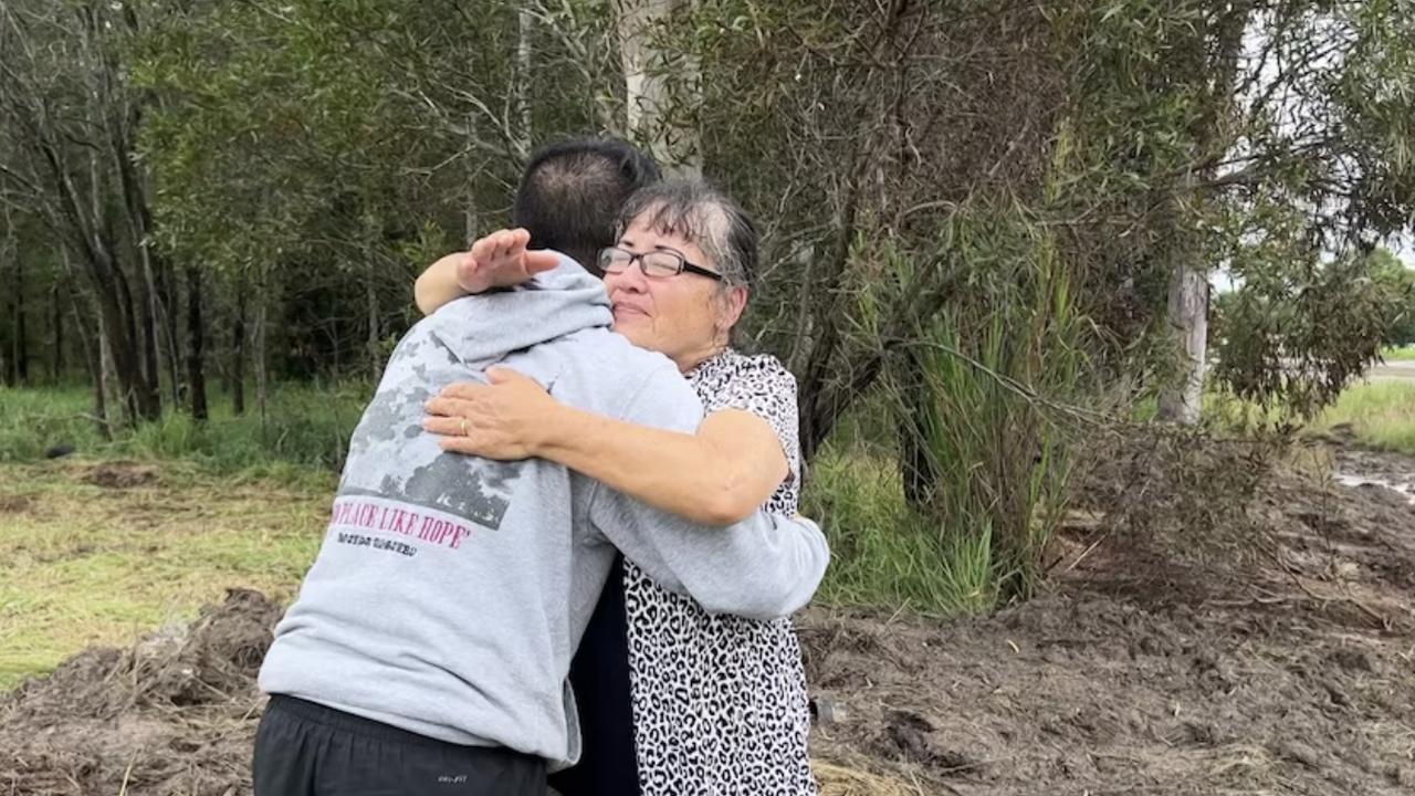 Betty Stuart and Jak Mullar met by the side of the Bruce Highway near Maryborough where Betty's husband Daniel and Jak's dad Tim Hickey died. Photo: ABC News