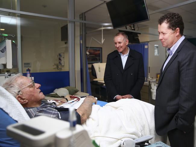 Premier Jay Weatherill and Health Minister Jack Snelling beside patient Allan Chenhall, 79, at the Port Lincoln Hospital. Picture: Sarah Reed