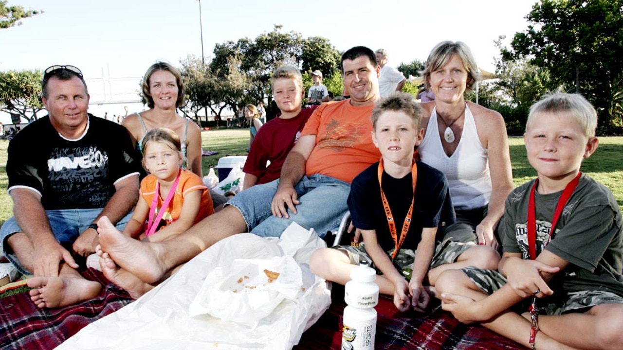 Gordon, Scharleine, Stacy (6), Hayden (8) O'Loughlin with Mark, Leonie, Josh (8) and Adam (6) Thompson in 2005 at Kings Beach. Picture: Anthony Reginato