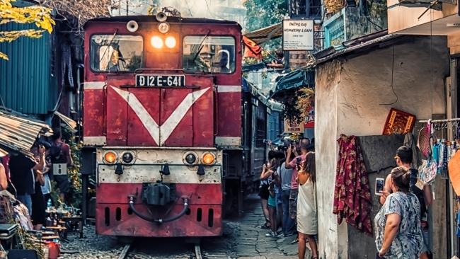 I try to finish my afternoon at Train Street, where you can experience the dizzying thrill of sitting in a cafe drinking coffee while a train flies by.