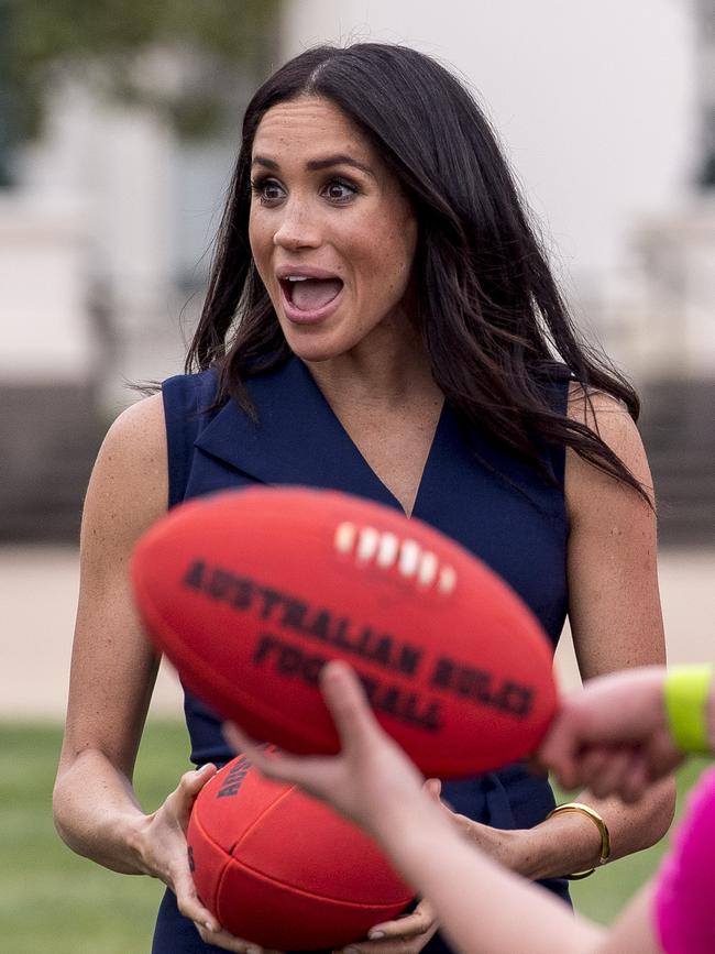 Meghan even kicked a footy around during her visit to Melbourne. Picture: Eddie Jim