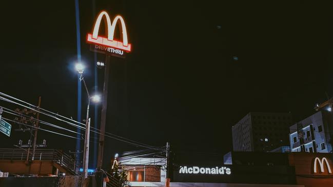 A man hugged the manager of a McDonald’s seconds after a robbery. Picture: Mikechie Esparagoza/Pexels