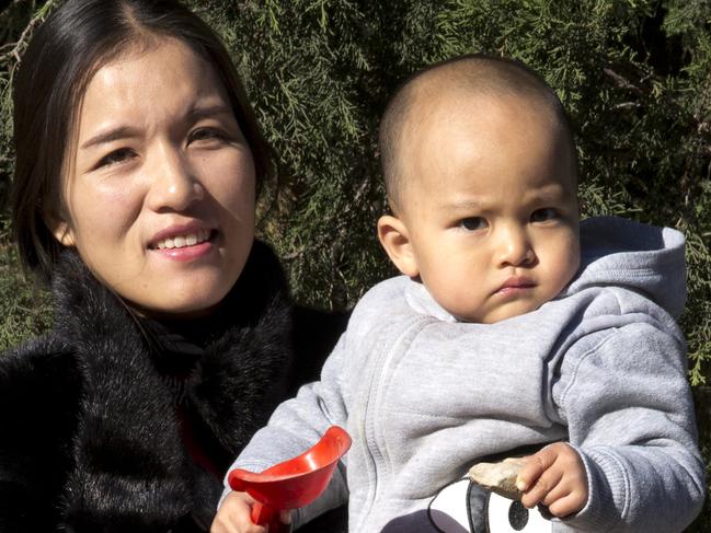 Chen Xiaoling poses with her son Xu Zhisheng at a park in Beijing, China, Friday, Oct. 30, 2015. Chen, from Hebei province outside Beijing, wasn’t eligible for more than one child, but had a second, anyway. She had to pay a 40,000-yuan ($6,325) fine. (AP Photo/Ng Han Guan)