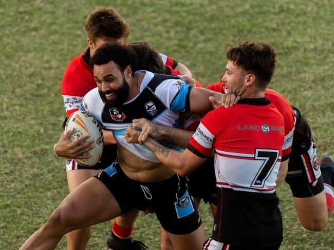 Sharks’ Stephen Fairweather punches on through the Litchfield defence. Picture: Che Chorley