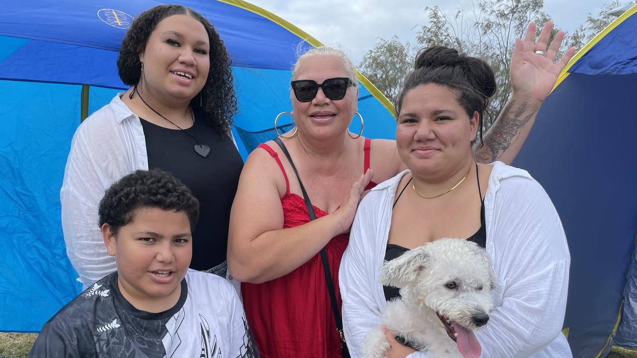 Stevie, Mariska, Lulu and Millie Kennedy with family dog Simba celebrating at the Broadwater Parklands in Southport.