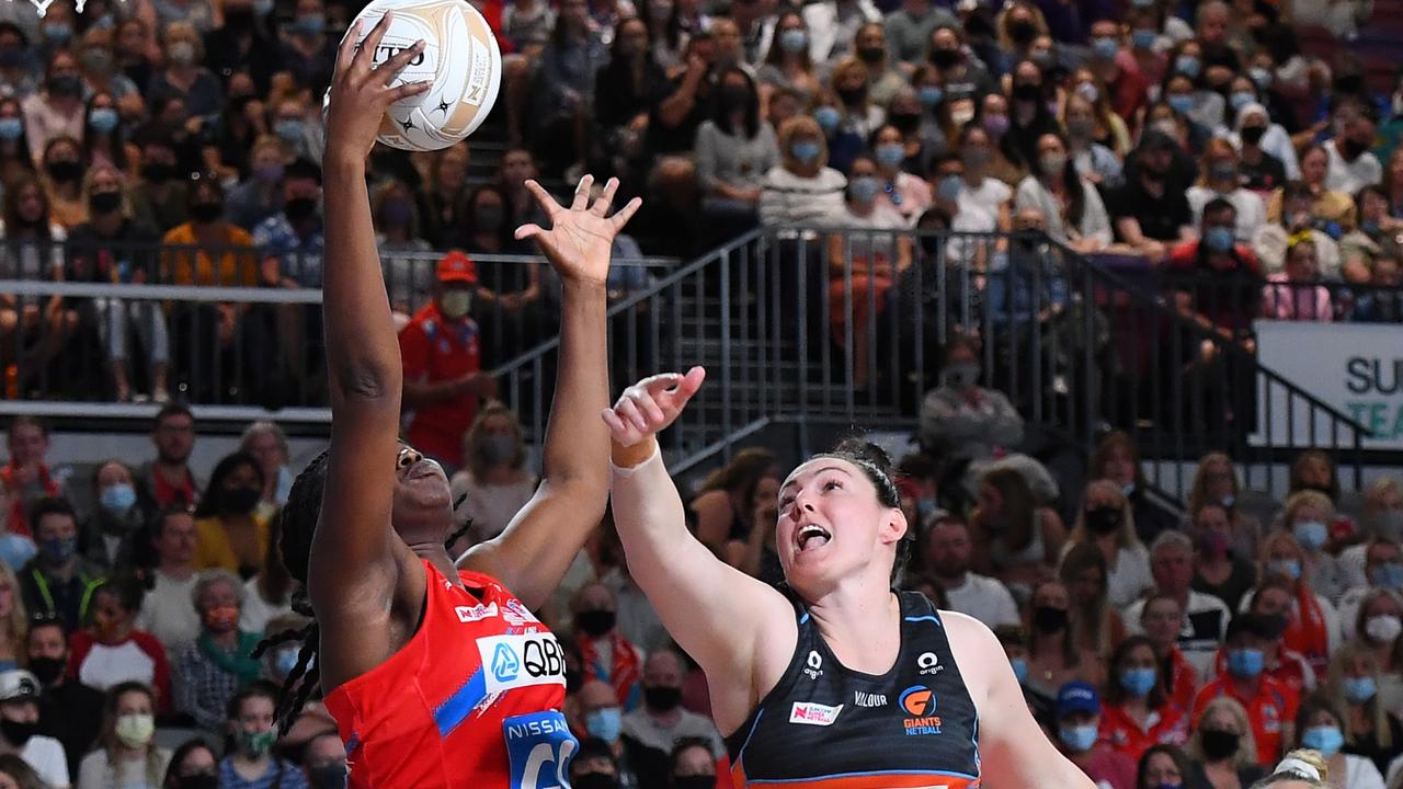 Sam Wallace gets up above Giants goalkeeper Sam Poolman to drag the ball in, in the manner that has earnt her the nickname the venus fly trap from teammates. Photo: Getty Images