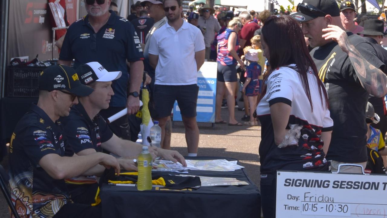 Supercars drivers Mark Winterbottom and David Reynolds meeting fans on Merch Alley at the 2024 Darwin Triple Crown. Picture: Darcy Jennings.