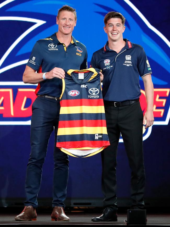 Adelaide's number 16 pick Ned McHenry with Brett Burton. Picture: Michael Willson/AFL Media/Getty Images