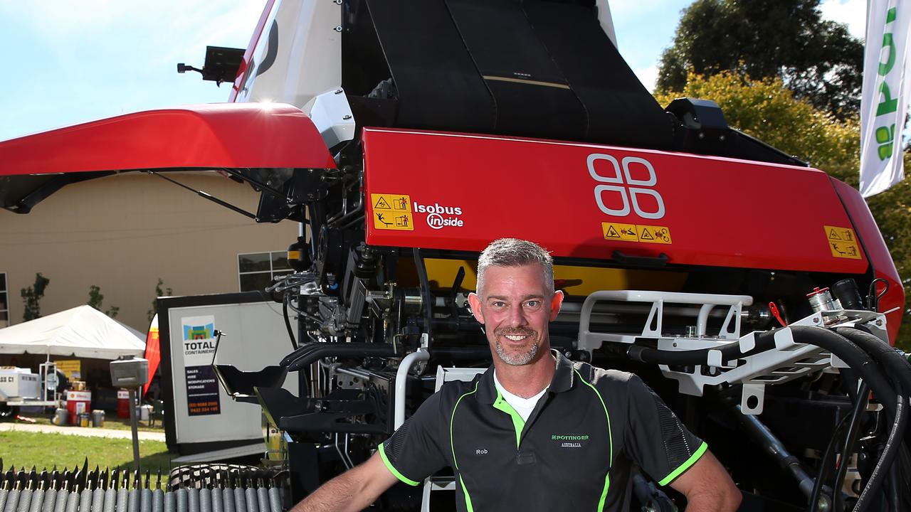 Rob West, Poettinger Australia’s National Service Product Support Manager, closely inspects the new Poettinger Impress 155VPRO at Farm World, Lardner Park. Picture Yuri Kouzmin