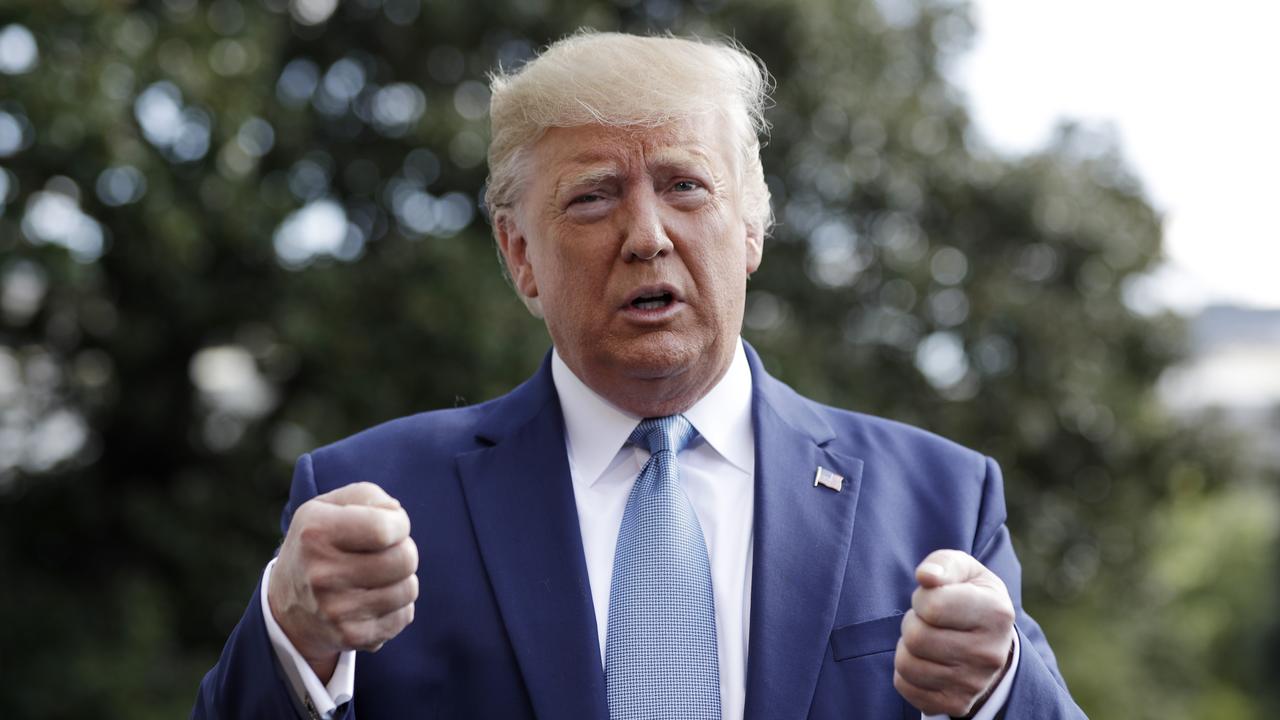 President Donald Trump talks to reporters on the South Lawn of the White House, Friday, October 4, 2019, in Washington. Picture: AP/Evan Vucci.