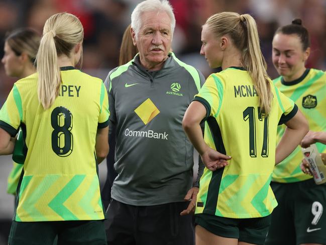 Matildas interim coach Tom Sermanni speaks to players Kaitlyn Torpey (left) and Holly McNamara after Australia’s 2-1 loss to USA. Picture: Chris Coduto/Getty Images