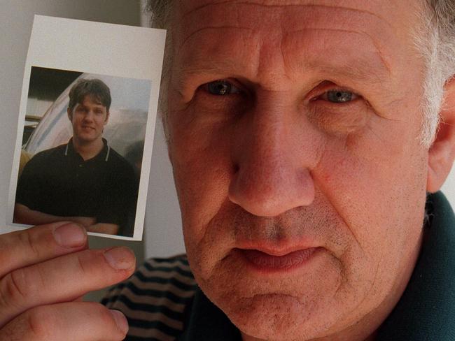 Steve Dymott with a photo of his son.