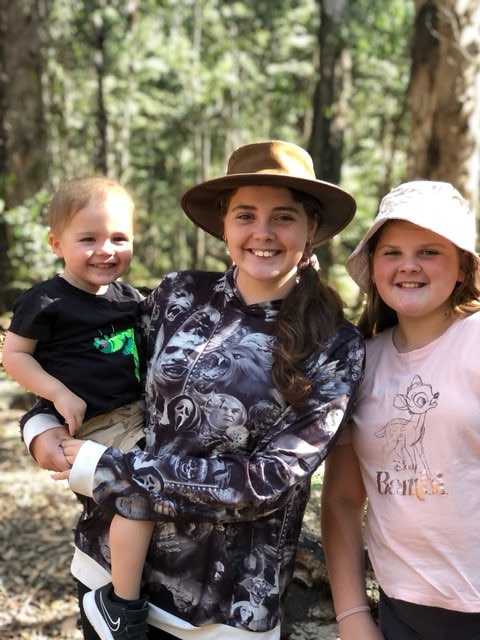 Ebony Miller, 14, with siblings Ruby, 11, and Jasper, 3. Picture: Supplied