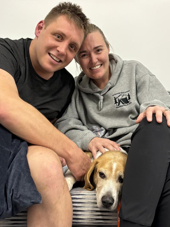 Joseph Murdock and his partner Casey Knight with their 10-year-old beagle Harley after his ordeal.