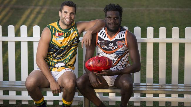 Ainsley Walker, from the APY Lands, will play with the Eagles this weekend. Jared Petrenko (left) models the Eagles’ Indigenous jumper. Picture: Naomi Jelice