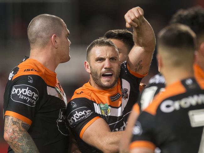 Robbie Farah of the Tigers celebrates at full time during the Round 18 NRL match between the St George-Illawarra Dragons. Picture: AAP Image