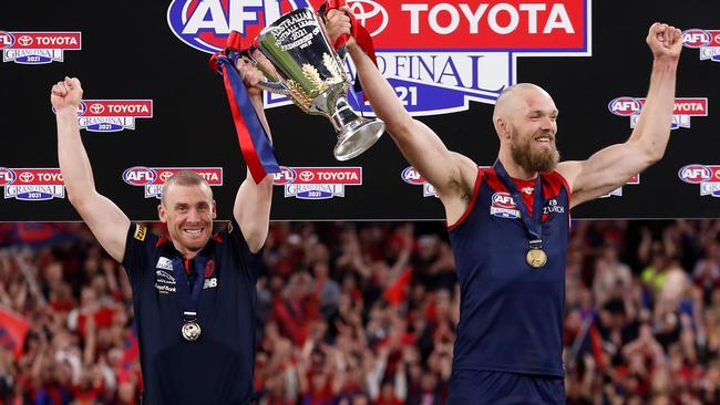 Simon Goodwin and Max Gawn lift the premiership cup. Picture: Getty Images