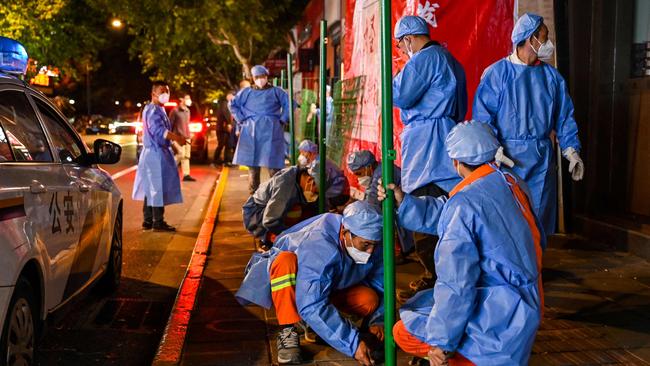 A fence is erected around a neighbourhood during lockdown in Shanghai’s Changning district, after new Covid-19 cases were reported last week. Picture: AFP)