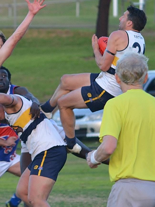 Russell Robertson flying for Doveton Eagles.