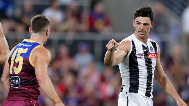 BRISBANE, AUSTRALIA - APRIL 06: Dayne Zorko of the Lions and Scott Pendlebury of the Magpies exchange words during the 2023 AFL Round 04 match between the Brisbane Lions and the Collingwood Magpies at the Gabba on April 6, 2023 in Brisbane, Australia. (Photo by Russell Freeman/AFL Photos via Getty Images)