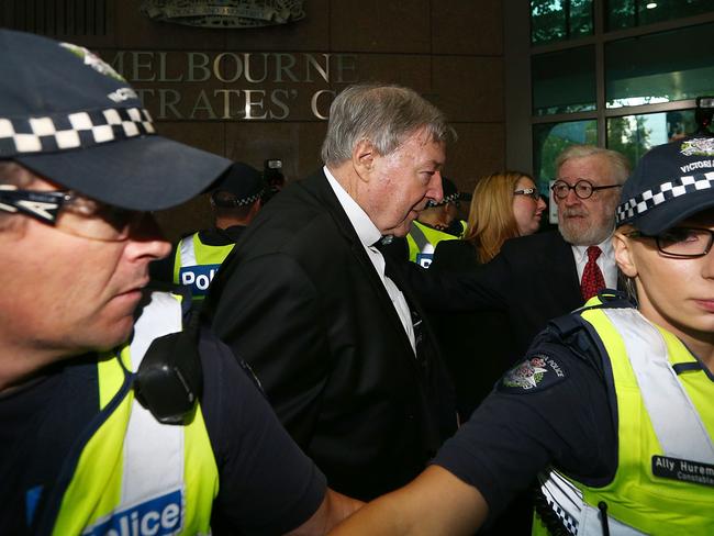 MELBOURNE, AUSTRALIA - MAY 01:  Cardinal George Pell (L) arrives with his defending lawyer Robert Richter QC at Melbourne Magistrates' Court on May 1, 2018 in Melbourne, Australia. Cardinal Pell was charged on summons by Victoria Police on 29 June 2017 over multiple allegations of sexual assault. Cardinal Pell is Australia's highest ranking Catholic and the third most senior Catholic at the Vatican, where he was responsible for the church's finances. Cardinal Pell has leave from his Vatican position while he defends the charges.  (Photo by Michael Dodge/Getty Images)