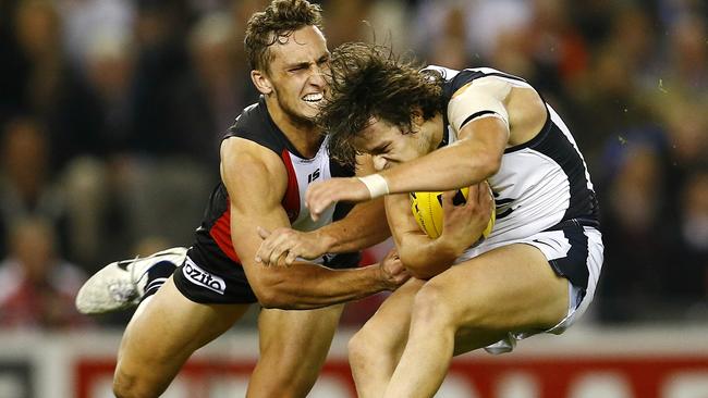 Luke Dunstan lays a strong tackle on Dylan Buckley. Picture: Michael Klein