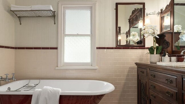 A claw foot bath adds to the traditional charm of the home.