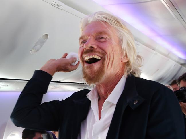 11/10/2018. Sir Richard Branson throwing around the hand towels, launching Virgin Australia's first meditation flight, and the introduction of new techniques for anxious flyers.  Jane Dempster/The Australian.