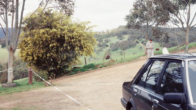 Invesigators at the scene of the murder in St Andrews.