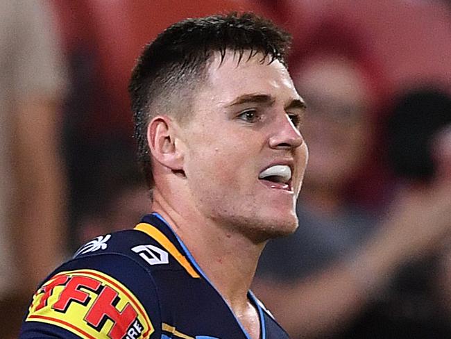 A J Brimson of the Titans reacts after scoring a try during the Round 9 NRL match between the Gold Coast Titans and the Cronulla Sharks at Suncorp Stadium in Brisbane, Thursday, May 9, 2019.  (AAP Image/Dave Hunt) NO ARCHIVING, EDITORIAL USE ONLY