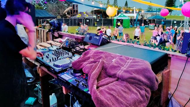 Towels were used to protect the technology on stage when rain began to fall on Mi Casa Su Casa over the weekend.
