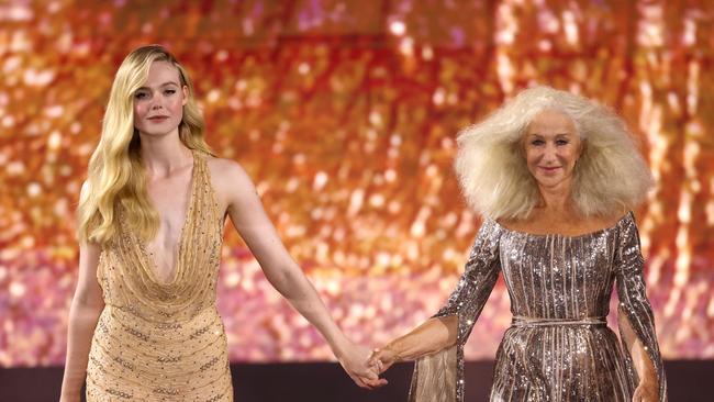 Elle Fanning and Helen Mirren walk the runway during "L’Oreal Paris - Walk Your Worth" Show as part of 2023 Paris Fashion Week. Picture: Pietro S. D'Aprano / Getty Images for L'Oreal Paris