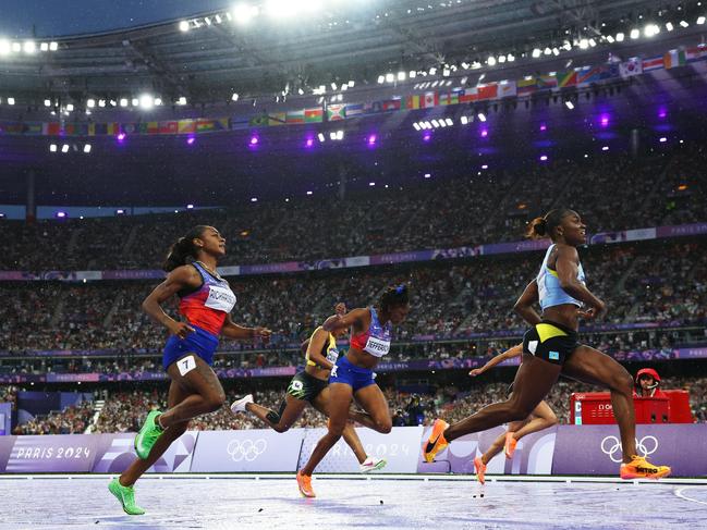 Gold medalist Julien Alfred of Team Saint Lucia, silver medalist Sha'Carri Richardson of Team United States and bronze medalist Melissa Jefferson of Team United States cross the finish line during the women’s 100m. Picture: Patrick Smith/Getty Images