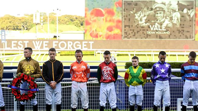 Jockeys at Randwick pay tribute to jockey Dean Holland, who passed away after a race fall at Donald on Monday, prior to the Anzac Day Cup.