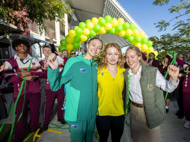 Students welcome Commonwealth Games swimmer Mollie O'Callaghan (middle) with Toby Stolberg and Ella Ramsay at St Peters, Springfield, Monday, August 15, 2022 - Picture: Richard Walker