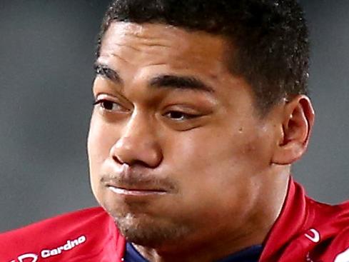 AUCKLAND, NEW ZEALAND - MAY 02: Chris Feauai-Sautia of the Reds is tackled by Jerome Kaino of the Blues during the round 12 Super Rugby match between the Blues and the Reds at Eden Park on May 2, 2014 in Auckland, New Zealand. (Photo by Phil Walter/Getty Images)