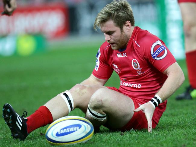 Ben Lucas of the Reds injured during the Super Rugby match between the Queensland Reds and the New South Wales Waratahs. Pic Darren England.