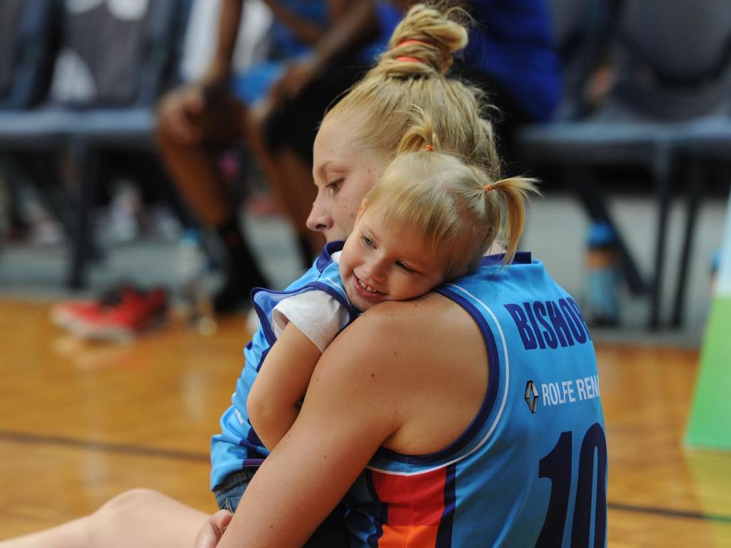 Cuddles on the court with Abby and Zala.