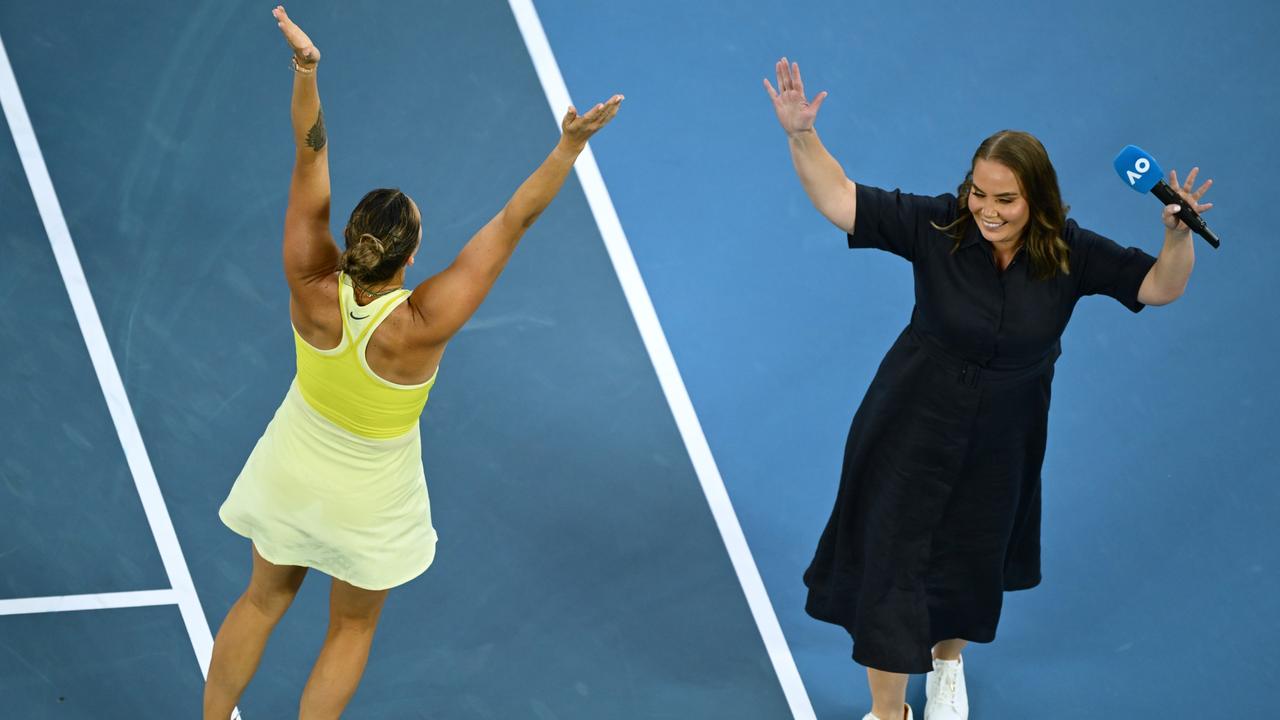 Aryna Sabalenka dances with on-court presenter Jelena Dokic. Photo by Hannah Peters/Getty Images.