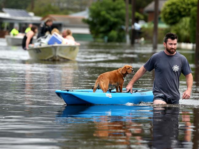 Dave Soury with his dog Scout at North Haven south of Port Macquarie. Picture: Nathan Edwards