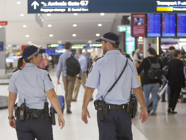 An Australian Federal Police officer told Ginger people die on planes ‘all the time’. Picture: AFP