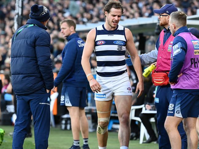 Jake Kolodjashnij in pain on the bench. Picture: Quinn Rooney/Getty Images