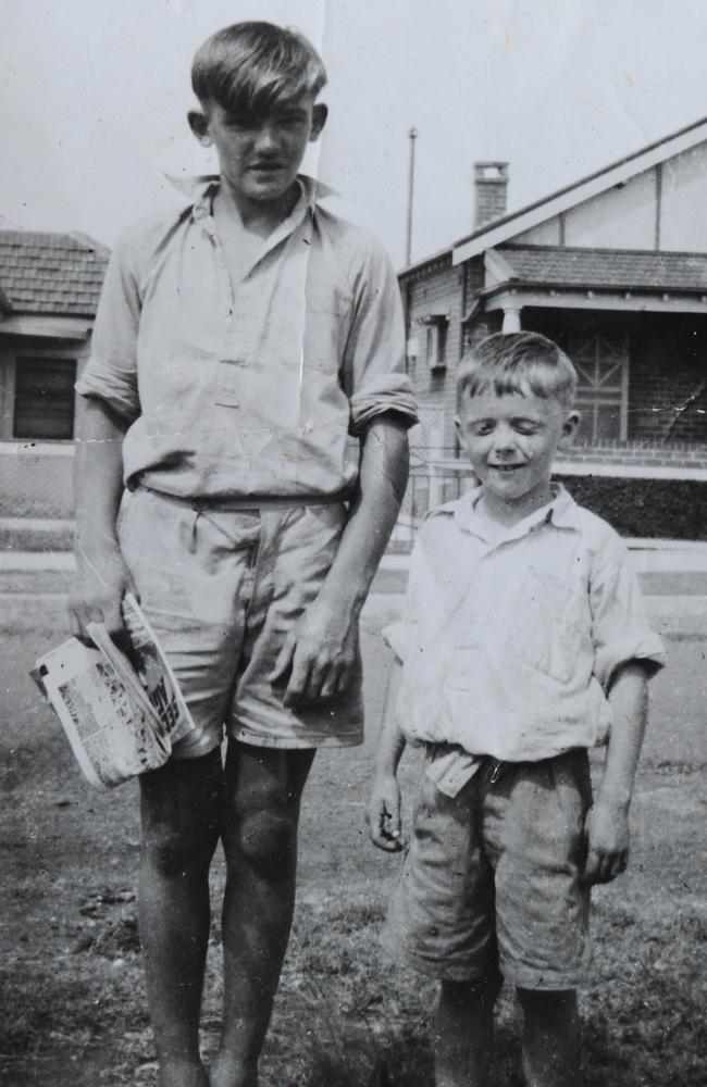 Carl Synnerdahl, as a boy, with a neighbour.