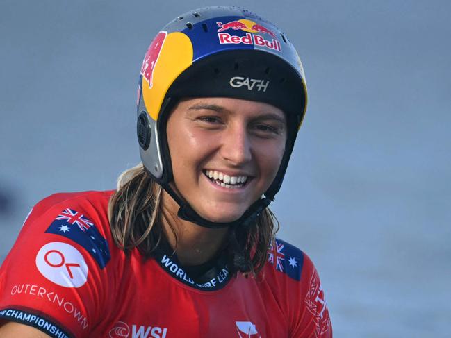 Australian surfer Molly Picklum sits on her board during her women's quarterfinal round of the Shiseido Tahiti Pro surfing competition against French surfer Vahine Fierro (not pictured), in Teahupo'o, on the French Polynesian Island of Tahiti, on May 29, 2024. Teahupo'o will host the surfing event of the Paris 2024 Olympic Games. (Photo by JEROME BROUILLET / AFP)