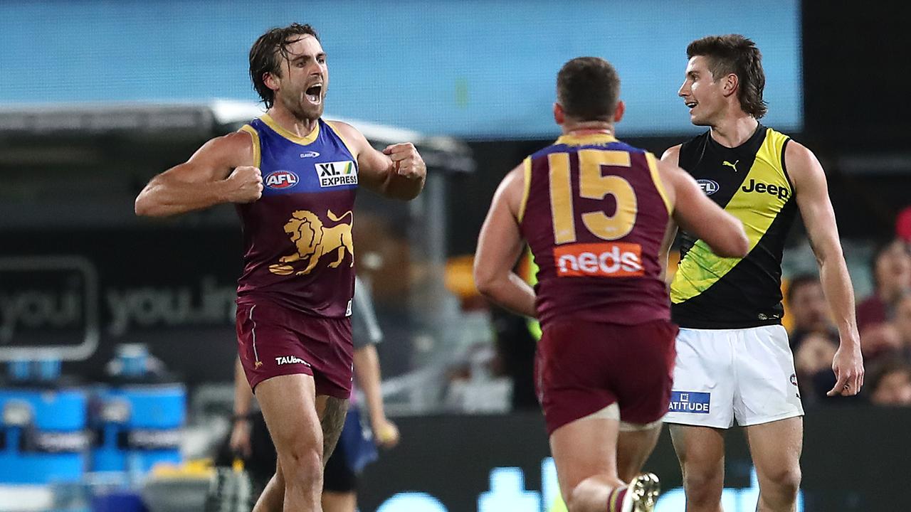 Rhys Mathieson of the Lions reacts towards Liam Baker of the Tigers. Picture: Jono Searle