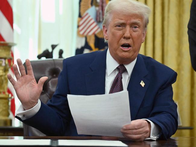 US President Donald Trump speaks in the Oval Office of the White House as he announces reciprocal tariffs, in Washington, DC. Picture: AFP