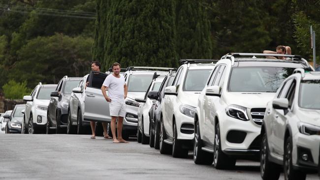 Northern beaches residents wait to be tested at the Manly COVID-19 clinic on Monday. Picture: David Swift