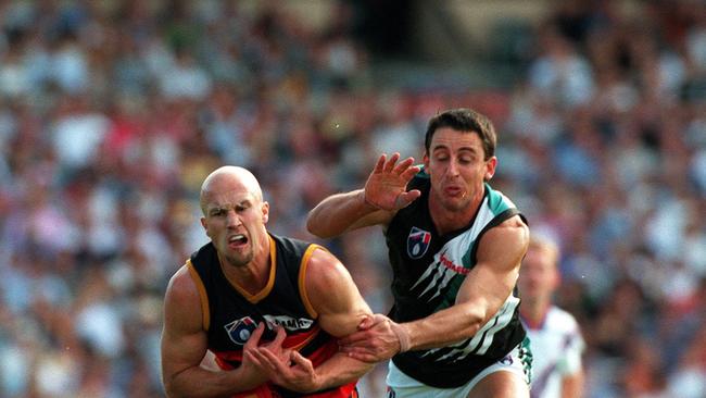 Footballer Darren Mead (r) with Nigel Smart. AFL football - Adelaide Crows vs Port Adelaide Power first derby showdown match at Football Park. a/ct /Football/AFL